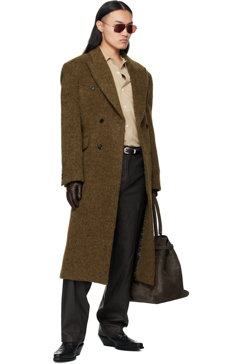 Shag-knit wool- and suri alpaca-blend coat. 

· Peaked lapel 
· Double-breasted button closure
· Flap pockets at waist
· Buttoned surgeon's cuffs
· Central vent at back hem
· Welt pocket at interior 
· Full satin lining 

Supplier color: Khaki