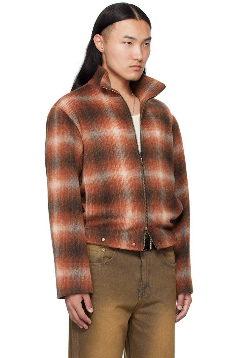 Wool-blend brushed flannel jacket. 

· Check pattern throughout 
· Stand collar 
· Two-way zip closure
· Seam pockets at waist
· Rivets at front hem 
· Full satin lining 
· Bronze-tone hardware

Supplier color: Brown
