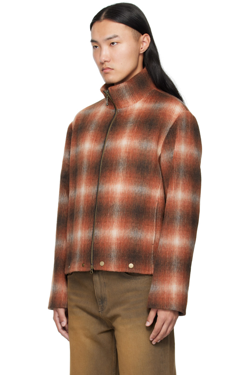 Wool-blend brushed flannel jacket. 

· Check pattern throughout 
· Stand collar 
· Two-way zip closure
· Seam pockets at waist
· Rivets at front hem 
· Full satin lining 
· Bronze-tone hardware

Supplier color: Brown