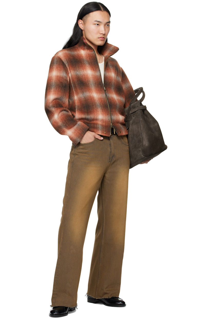 Wool-blend brushed flannel jacket. 

· Check pattern throughout 
· Stand collar 
· Two-way zip closure
· Seam pockets at waist
· Rivets at front hem 
· Full satin lining 
· Bronze-tone hardware

Supplier color: Brown
