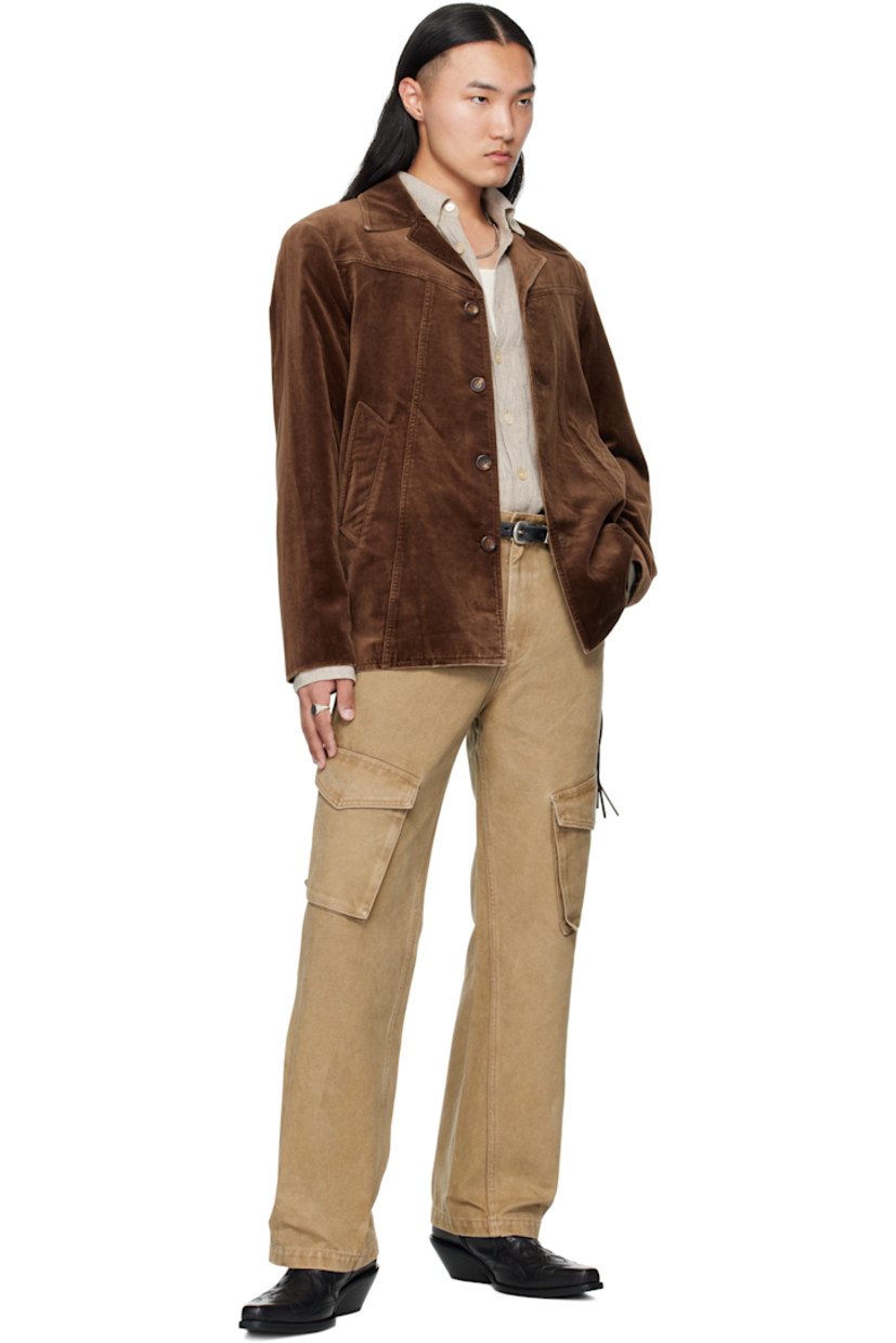 Cotton velvet jacket. 

· Open spread collar 
· Button closure 
· Welt pockets at front and interior 
· Full satin lining

Supplier color: Brown