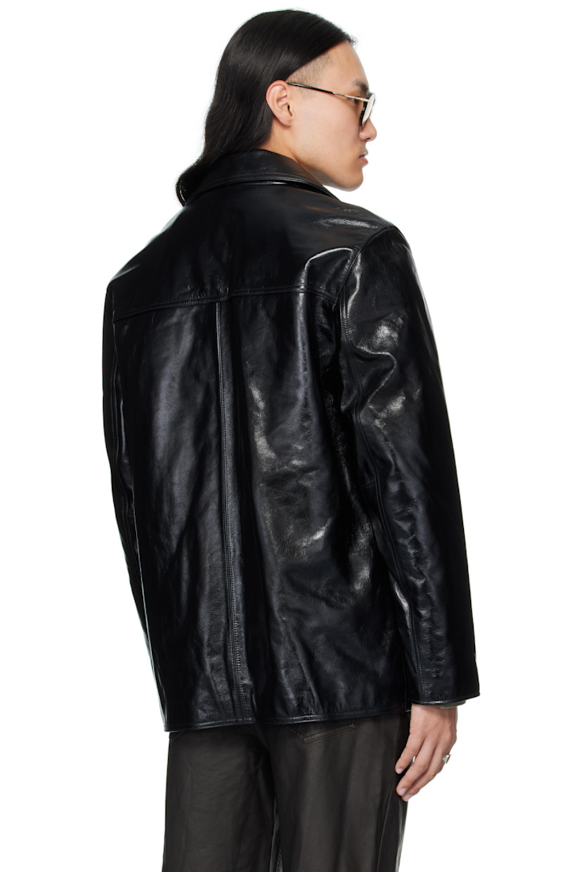 Insulated crinkled leather jacket. 

· Open spread collar 
· Button closure 
· Welt pockets at front and interior 
· Full quilted twill lining

Supplier color: Black