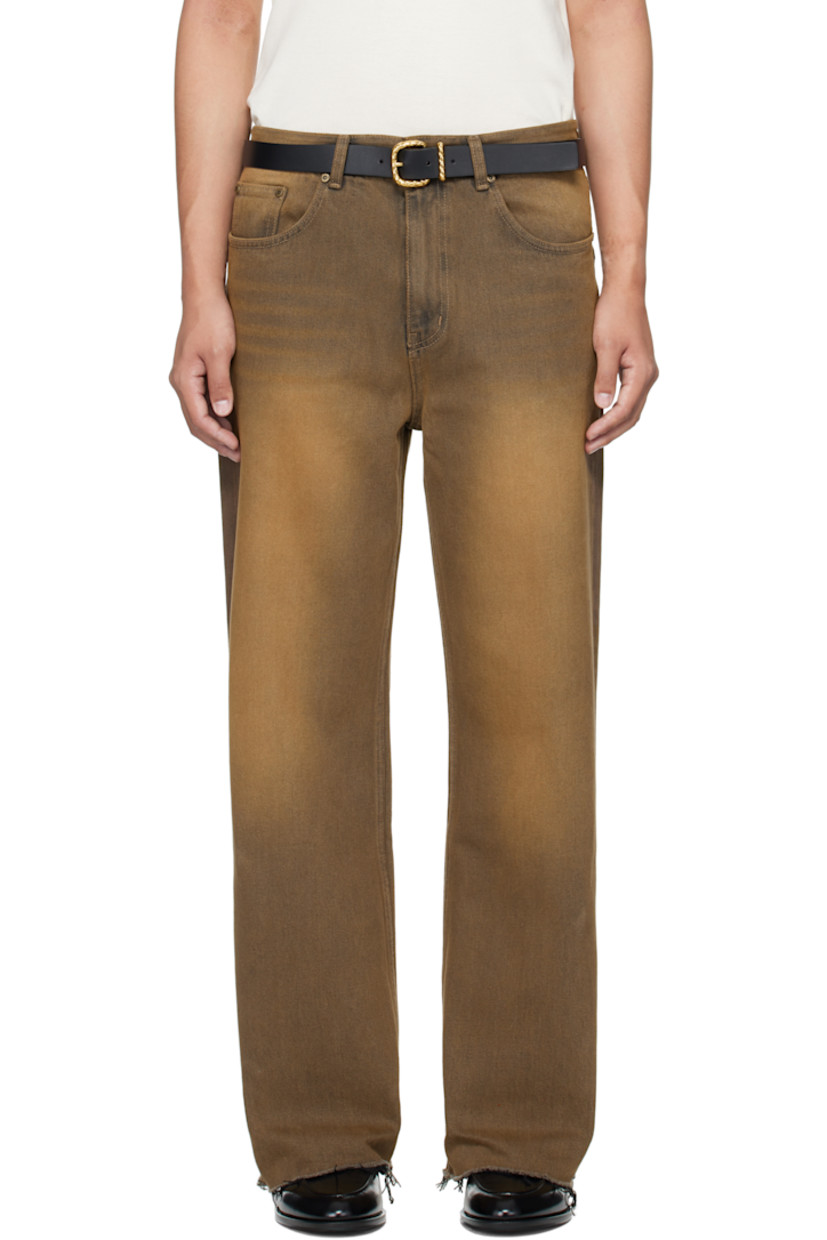 Non-stretch denim jeans. 

· Fading and whiskering throughout
· Flared
· Belt loops
· Five-pocket styling
· Zip fly 
· Frayed edge at cuffs
· Logo patch at back waistband
· Logo-engraved bronze-tone hardware

Supplier color: Brown
