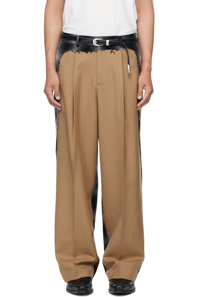 Wool twill and hopsack trousers.

· Paneled construction
· Check flannel panel with raw edges throughout 
· Belt loops
· Four-pocket styling
· Zip fly 
· Pleats at front 
· Creased legs

Supplier color: Beige