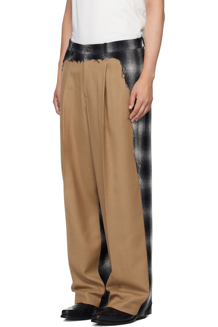 Wool twill and hopsack trousers.

· Paneled construction
· Check flannel panel with raw edges throughout 
· Belt loops
· Four-pocket styling
· Zip fly 
· Pleats at front 
· Creased legs

Supplier color: Beige