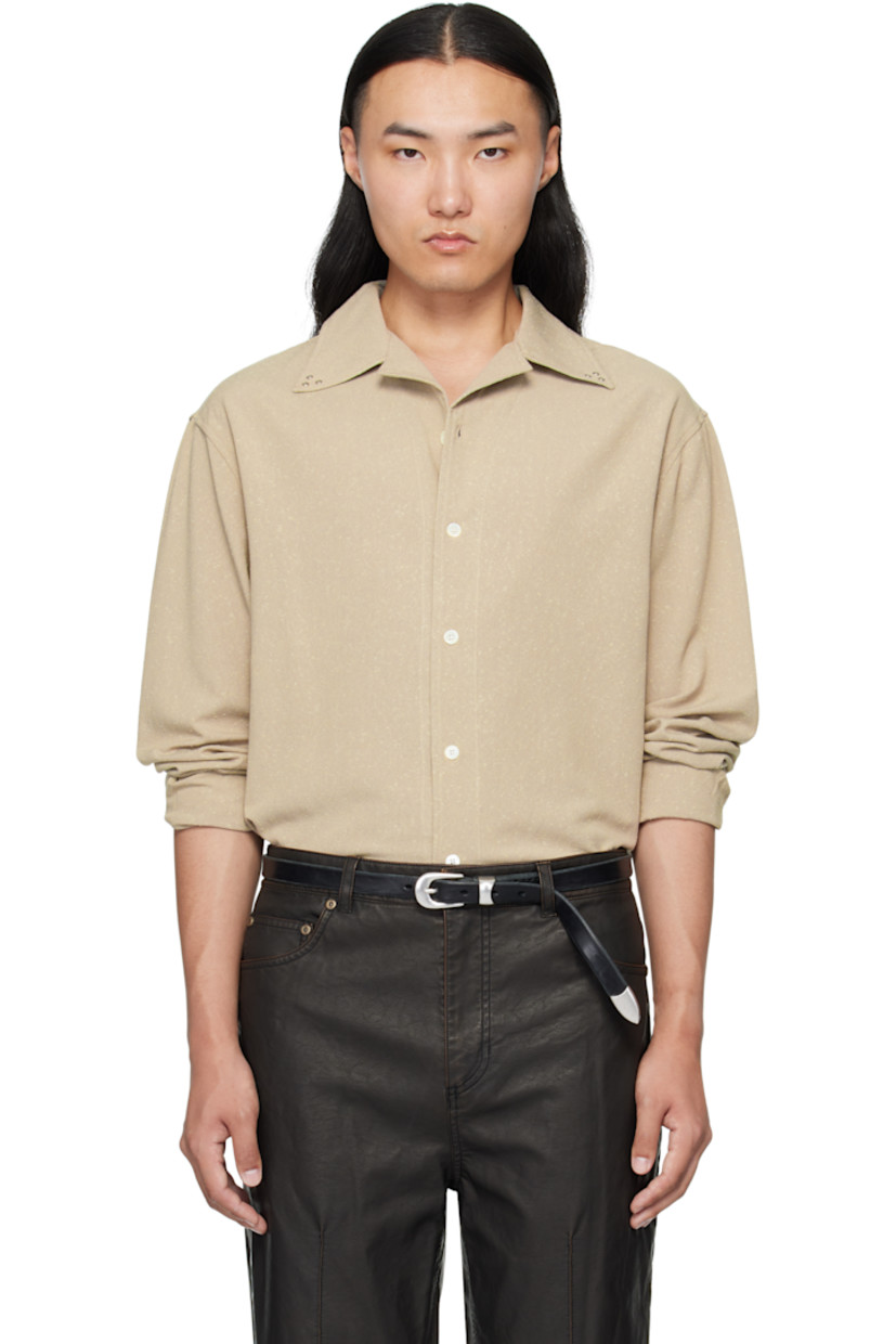 Plain-woven cotton-blend shirt. 

· Piling throughout 
· Rivets at open spread collar 
· Button closure
· Shirttail hem 
· Buttoned barrel cuffs

Supplier color: Khaki beige
