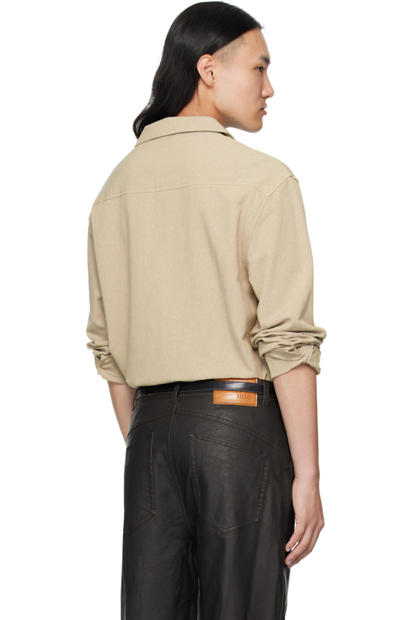 Plain-woven cotton-blend shirt. 

· Piling throughout 
· Rivets at open spread collar 
· Button closure
· Shirttail hem 
· Buttoned barrel cuffs

Supplier color: Khaki beige