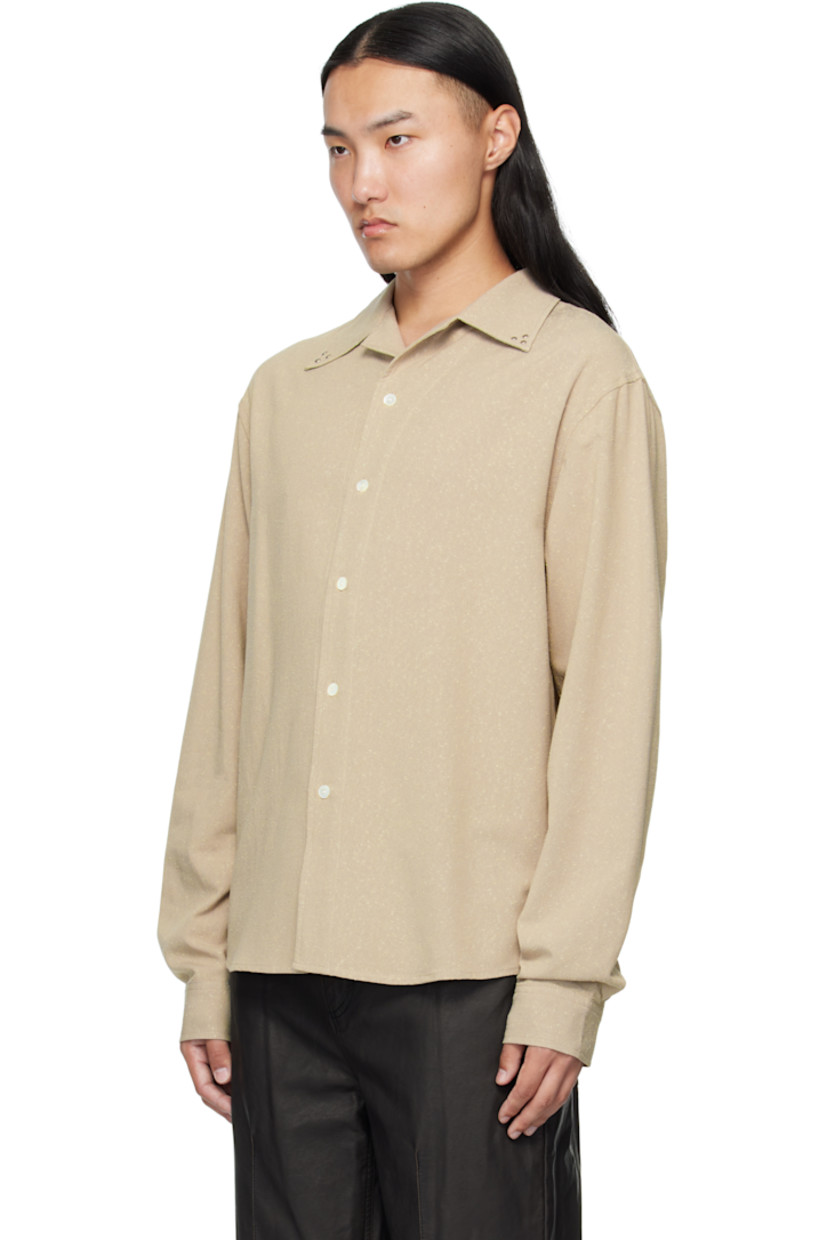 Plain-woven cotton-blend shirt. 

· Piling throughout 
· Rivets at open spread collar 
· Button closure
· Shirttail hem 
· Buttoned barrel cuffs

Supplier color: Khaki beige