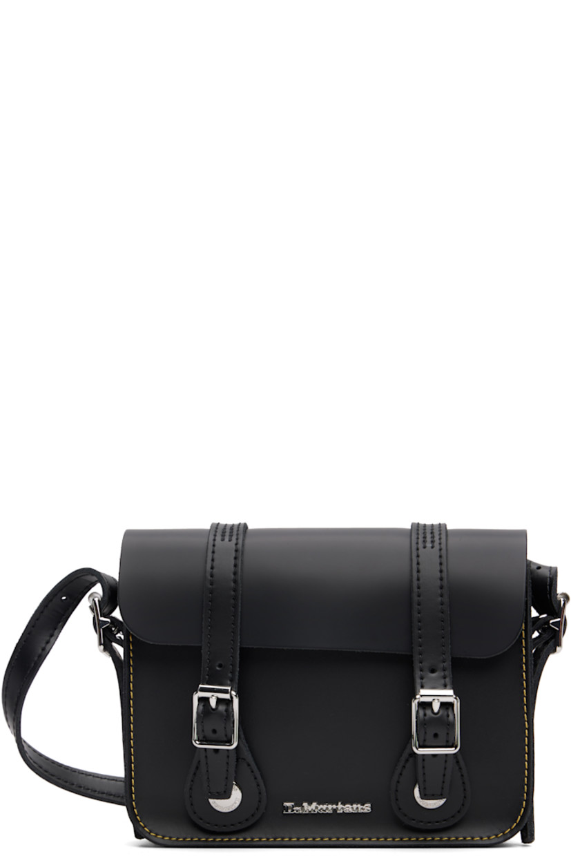 Buffed leather shoulder bag.

· Adjustable crossbody strap
· Logo hardware at face
· Mock buckles at magnetic press-stud flap
· Suede lining
· Contrast stitching in yellow
· H5.5" x W7" x D2"

Supplier color: Black smooth leather