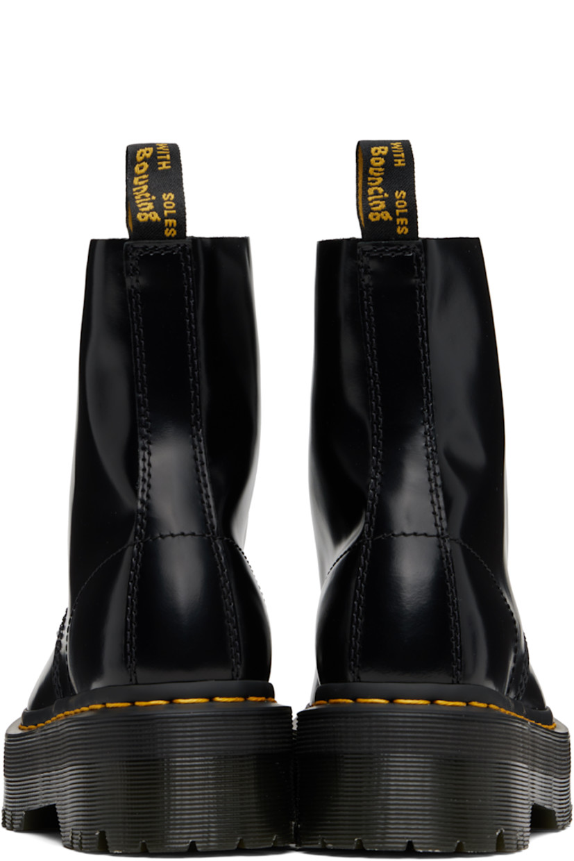 Ankle-high polished leather boots.

· Lace-up closure
· Pull-loop at heel collar
· Suede lining
· Yellow topstitching at heat-sealed Goodyear welt
· Treaded Air Cushion rubber platform sole
· Platform: H1.75"

Supplier color: Black buttero