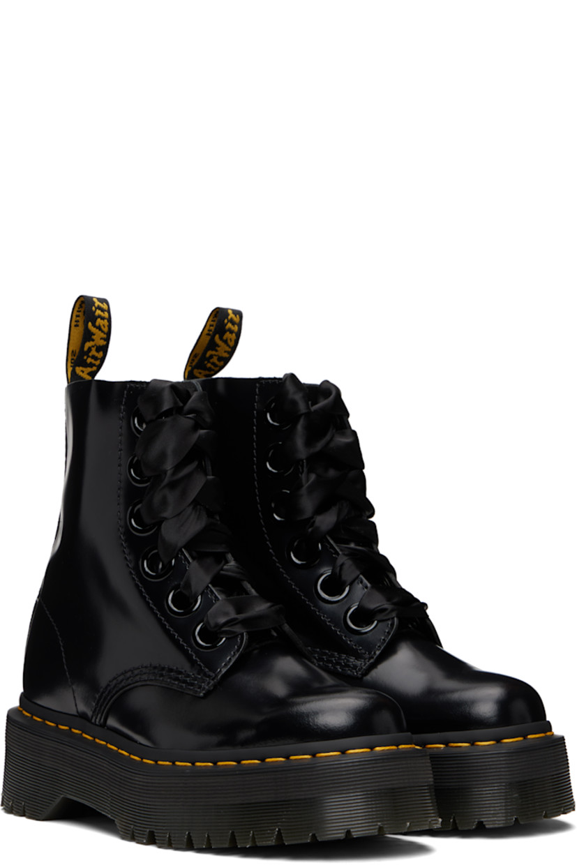 Ankle-high polished leather boots.

· Lace-up closure
· Pull-loop at heel collar
· Suede lining
· Yellow topstitching at heat-sealed Goodyear welt
· Treaded Air Cushion rubber platform sole
· Platform: H1.75"

Supplier color: Black buttero