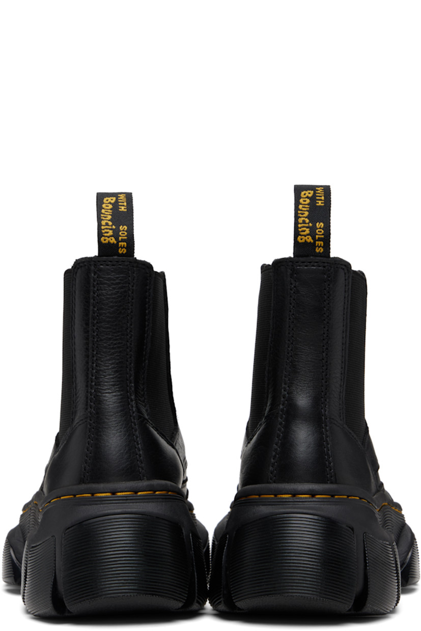 Ankle-high nappa leather Chelsea boots in black.

· Textured cap toe
· Zip closure
· Elasticized gusset at sides
· Pull-loop at heel collar
· Mesh lining
· Yellow topstitching at heat-sealed Goodyear welt
· Treaded Air Cushion rubber platform sole
· Platform: H2.25"

Supplier color: Black lunar