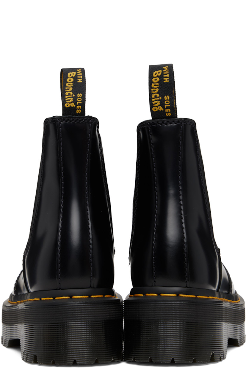 Ankle-high buffed leather Chelsea boots.

· Elasticized gusset at sides
· Pull-loop at heel collar
· Yellow topstitching at heat-sealed Goodyear welt
· Treaded Air Cushion rubber platform sole
· Platform: H1.75"

Supplier color: Black polished smooth