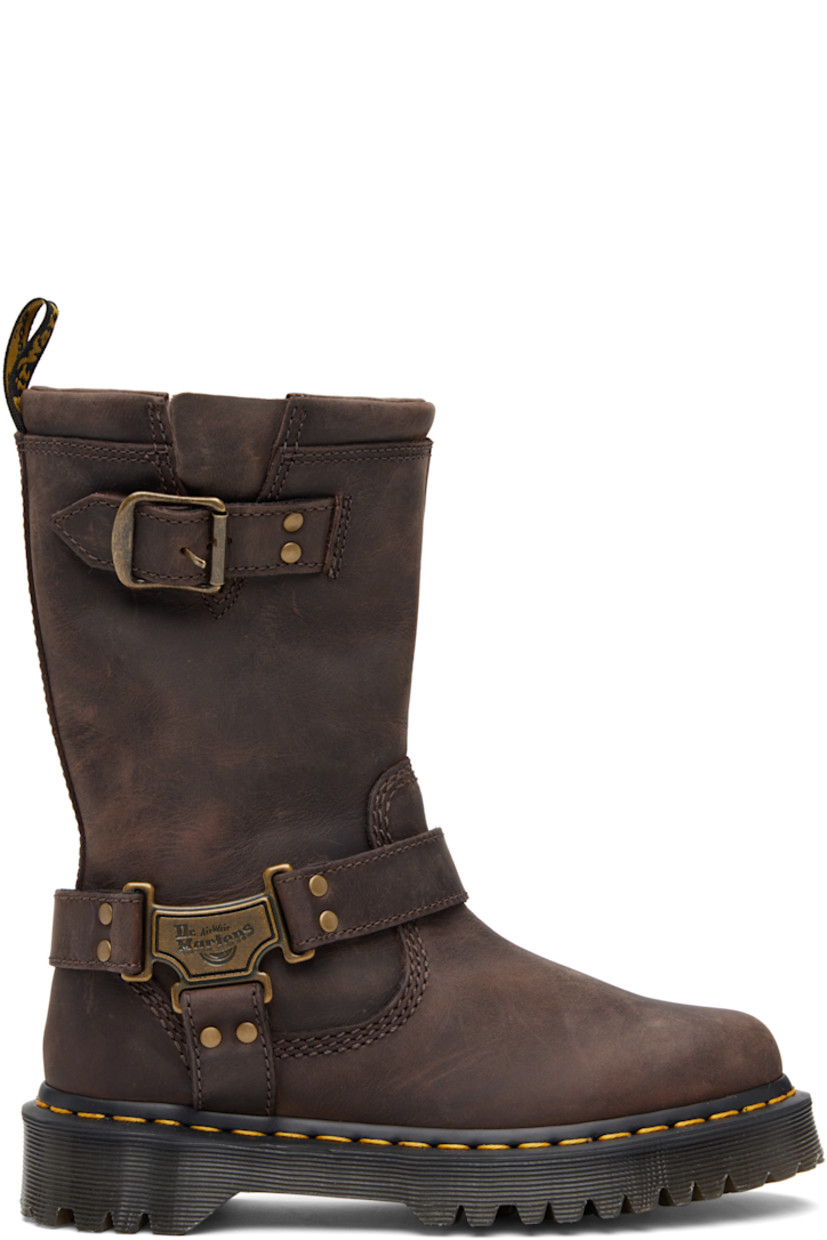Mid-calf waxed leather boots.

· Padded collar
· Gusset and pin-buckle strap at outer side
· Logo plaques at harness-style ankle strap
· Logo-woven pull-loop at heel collar
· Yellow topstitching at heat-sealed Goodyear welt
· Treaded Air Cushion rubber sole

Supplier color: Dark brown burnished waxy pull up wp