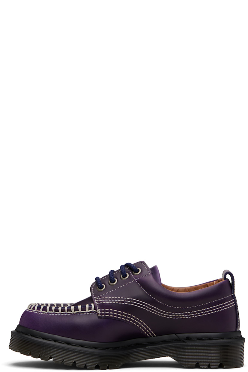 Buffed Orleans leather derbys.

· Blanket stitching at moc toe
· Lace-up closure
· Padded collar
· Pull-loop at heel collar
· Buffed leather lining
· Heat-sealed Goodyear welt
· Treaded Air Cushion rubber sole
· Contrast stitching in white

Supplier color: Midnight blue