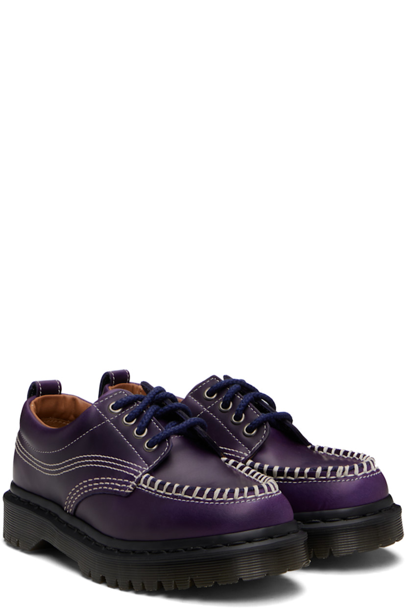 Buffed Orleans leather derbys.

· Blanket stitching at moc toe
· Lace-up closure
· Padded collar
· Pull-loop at heel collar
· Buffed leather lining
· Heat-sealed Goodyear welt
· Treaded Air Cushion rubber sole
· Contrast stitching in white

Supplier color: Midnight blue