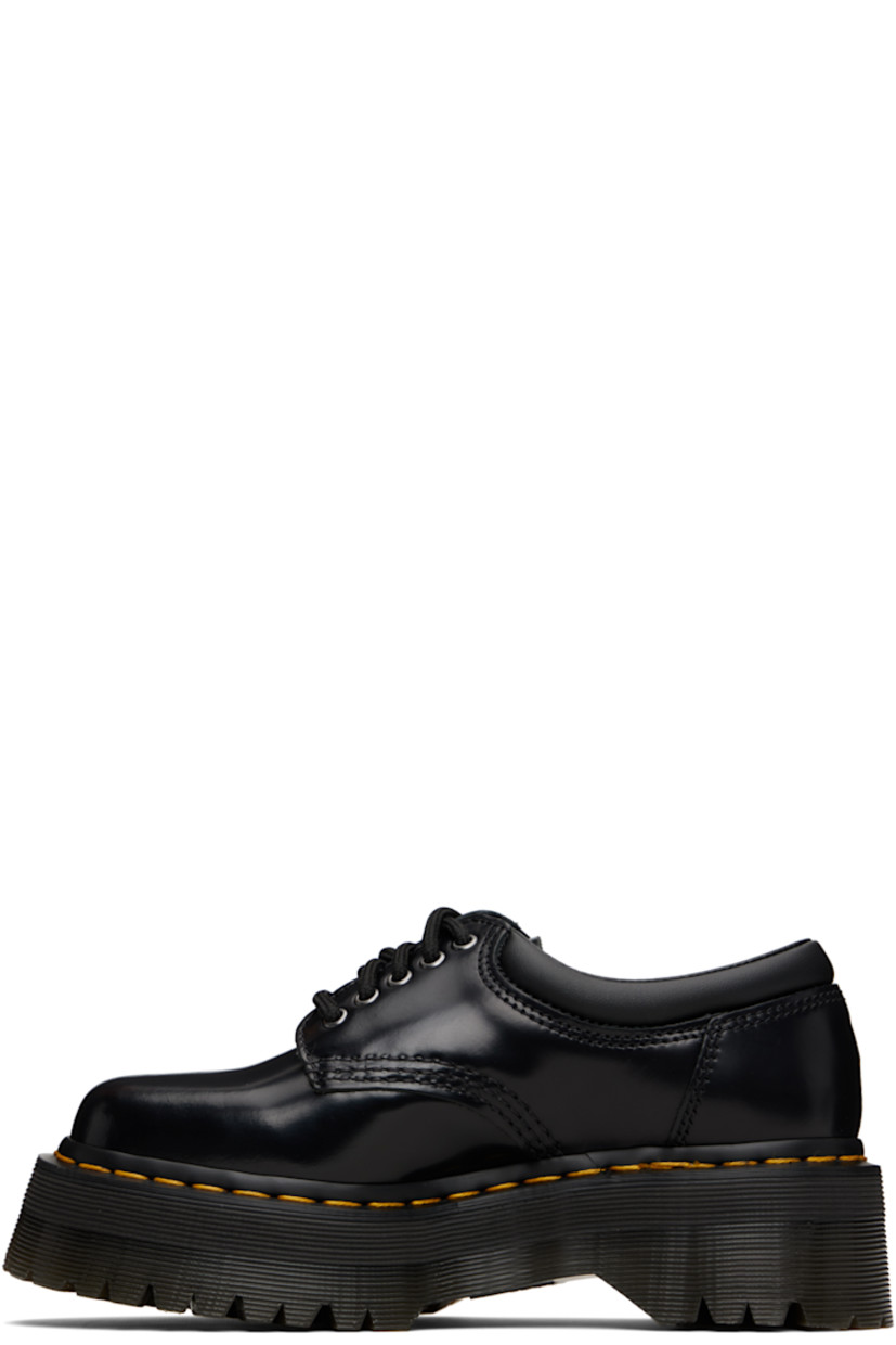 Polished leather derbys.

· Lace-up closure
· Padded collar
· Buffed leather lining
· Yellow topstitching at heat-sealed Goodyear welt
· Treaded Air Cushion rubber platform sole
· Platform: H1.75"

Supplier color: Black polished smooth