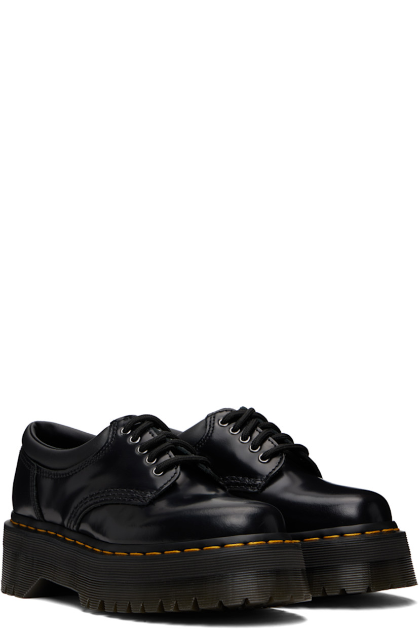 Polished leather derbys.

· Lace-up closure
· Padded collar
· Buffed leather lining
· Yellow topstitching at heat-sealed Goodyear welt
· Treaded Air Cushion rubber platform sole
· Platform: H1.75"

Supplier color: Black polished smooth