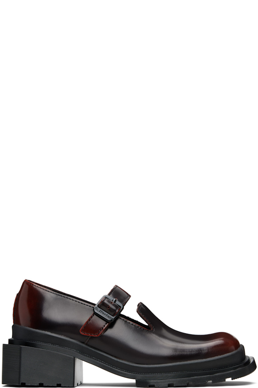 Polished leather Mary Jane-style heels.

· Square toe
· Pin-buckle strap at vamp
· Rubber block heel
· Serrated edge at welt
· Treaded Air Cushion rubber sole
· Heel: H1.75"

Supplier color: Black/Cherry red arcadia
