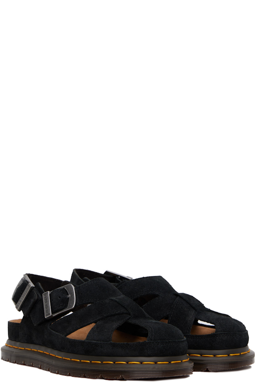 Suede flat sandals in black.

· Cutouts throughout
· Pin-buckle ankle strap and slingback strap
· Logo printed at molded footbed
· Yellow topstitching at heat-sealed Goodyear welt
· Treaded Air Cushion rubber sole

Supplier color: Black