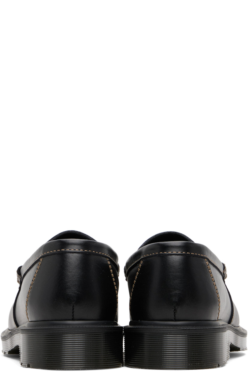 Buffed and pebble-grained calfskin loafers.

· Whipstitching at moc toe
· Strap with cutout at vamp
· Logo-engraved medallion hardware at vamp
· Faux-suede and buffed leather lining
· Goodyear welt
· Treaded Air Cushion rubber sole
· Logo-engraved antiqued silver-tone hardware
· Contrast stitching in taupe

Supplier color: Black westminster/Classic calf
