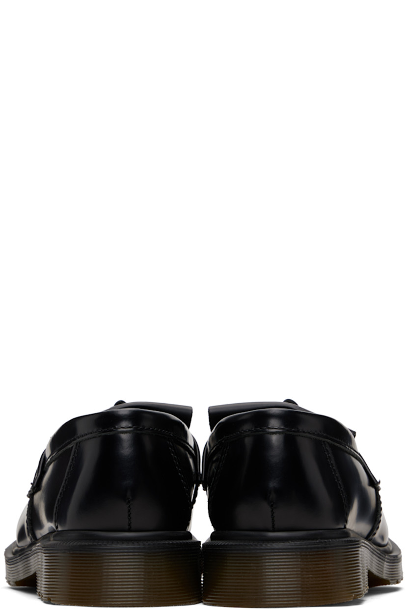 Polished leather loafers.

· Blanket stitching at moc toe
· Tassels and fringed detailing at vamp
· Suede lining
· Serrated detailing at heat-sealed Goodyear welt
· Treaded Air Cushion rubber sole
· Heel: H1.25"

Supplier color: Black polished smooth