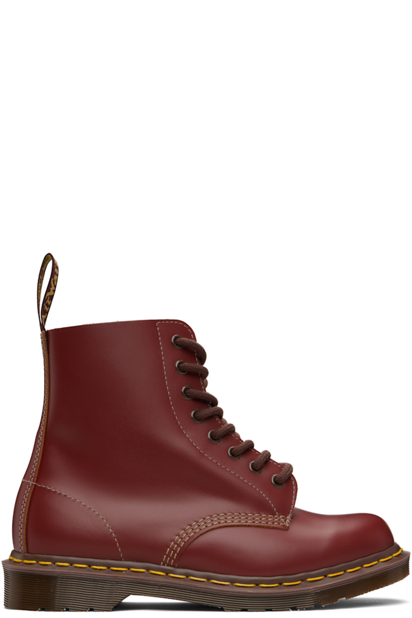 Handcrafted ankle-high buffed leather boots.

· Lace-up closure
· Jacquard logo-woven pull-loop at heel collar
· Suede interior
· Yellow stitching at heat-sealed Goodyear welt
· Treaded Air Cushion rubber sole
· Contrast stitching in tan

Supplier color: Oxblood