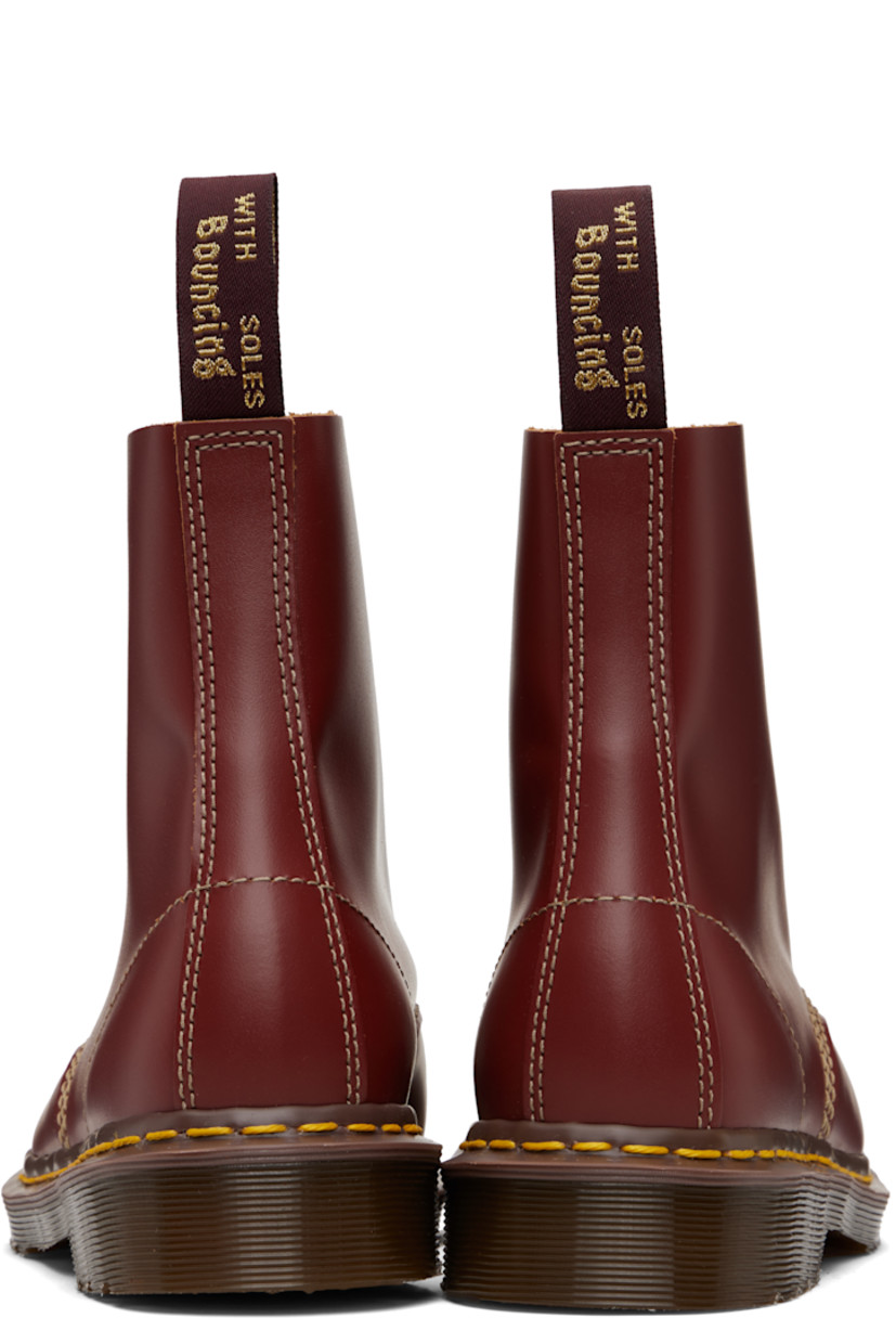 Handcrafted ankle-high buffed leather boots.

· Lace-up closure
· Jacquard logo-woven pull-loop at heel collar
· Suede interior
· Yellow stitching at heat-sealed Goodyear welt
· Treaded Air Cushion rubber sole
· Contrast stitching in tan

Supplier color: Oxblood