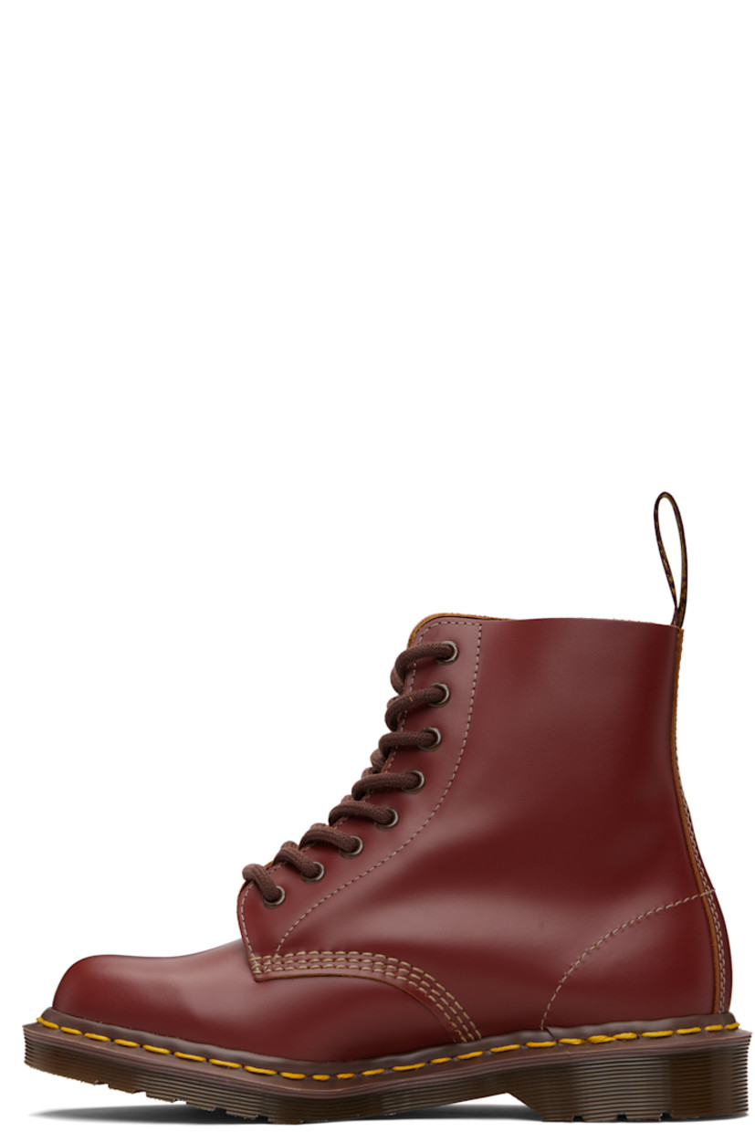 Handcrafted ankle-high buffed leather boots.

· Lace-up closure
· Jacquard logo-woven pull-loop at heel collar
· Suede interior
· Yellow stitching at heat-sealed Goodyear welt
· Treaded Air Cushion rubber sole
· Contrast stitching in tan

Supplier color: Oxblood