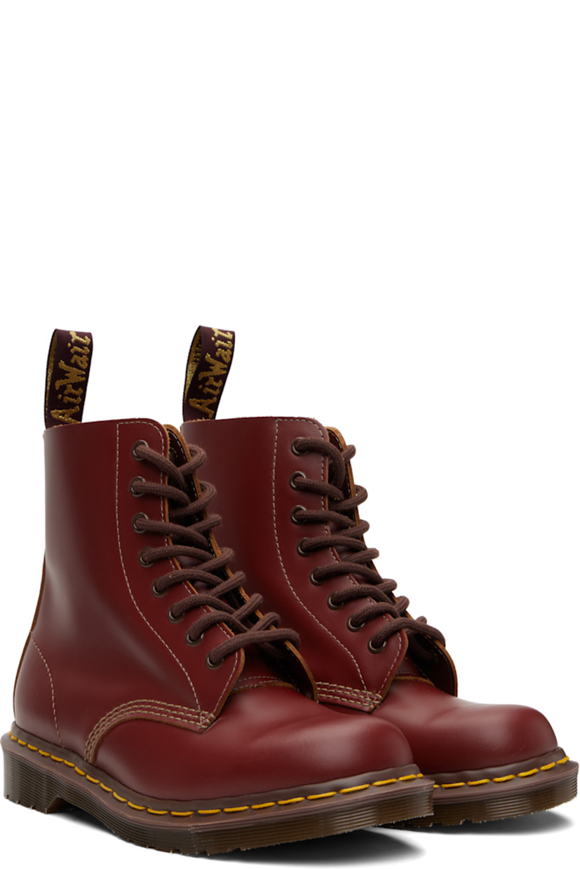 Handcrafted ankle-high buffed leather boots.

· Lace-up closure
· Jacquard logo-woven pull-loop at heel collar
· Suede interior
· Yellow stitching at heat-sealed Goodyear welt
· Treaded Air Cushion rubber sole
· Contrast stitching in tan

Supplier color: Oxblood