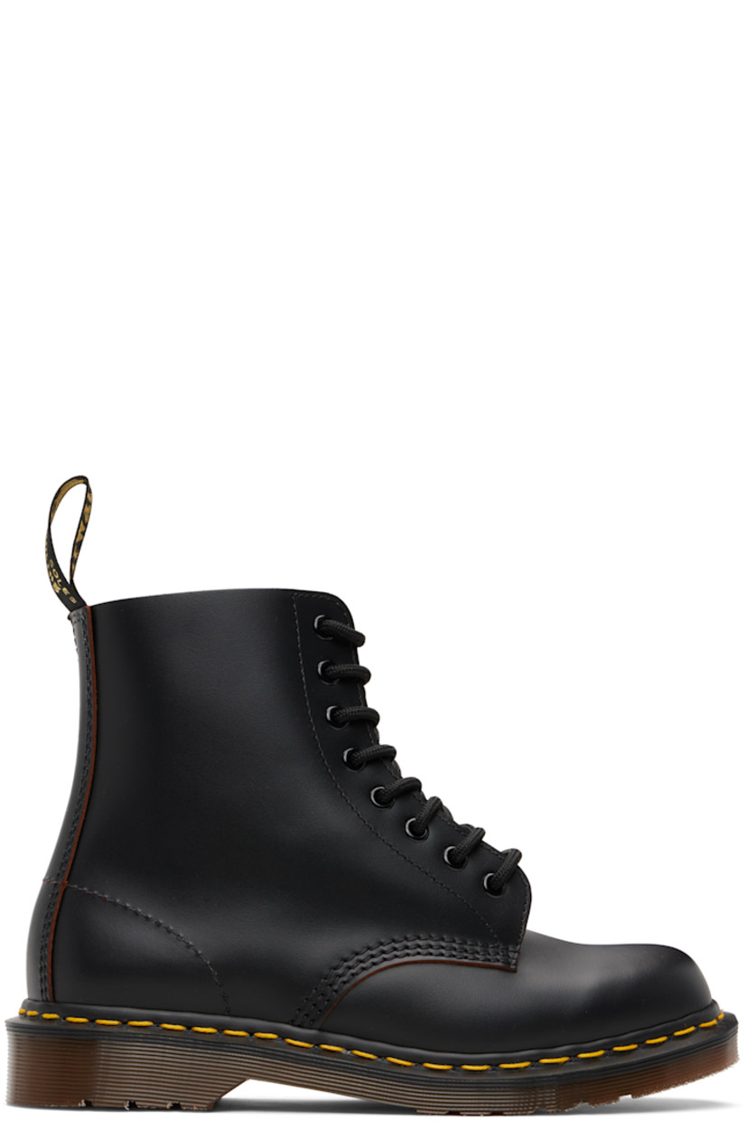 Handcrafted ankle-high buffed leather boots.

· Lace-up closure
· Jacquard logo-woven pull-loop at heel collar
· Textile lining
· Yellow stitching at heat-sealed Goodyear welt
· Treaded Air Cushion rubber sole

Supplier color: Black/Quilon