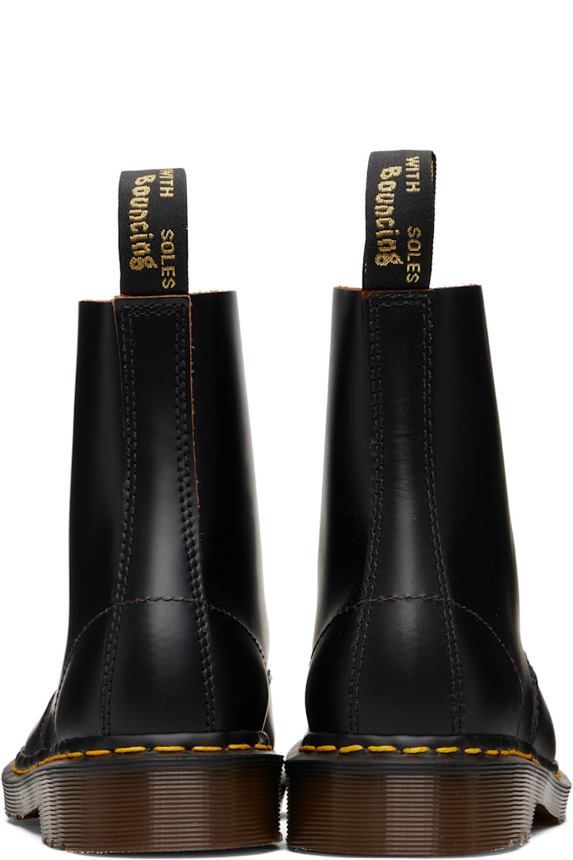 Handcrafted ankle-high buffed leather boots.

· Lace-up closure
· Jacquard logo-woven pull-loop at heel collar
· Textile lining
· Yellow stitching at heat-sealed Goodyear welt
· Treaded Air Cushion rubber sole

Supplier color: Black/Quilon