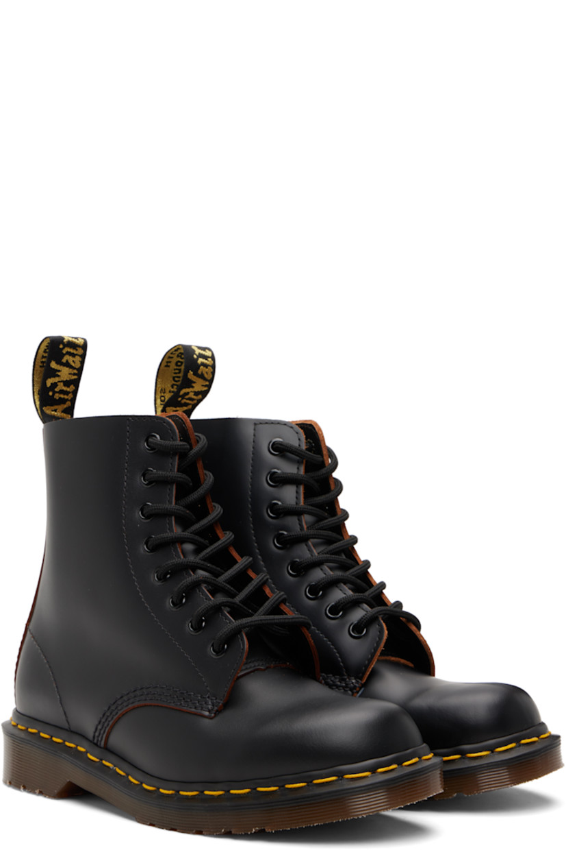 Handcrafted ankle-high buffed leather boots.

· Lace-up closure
· Jacquard logo-woven pull-loop at heel collar
· Textile lining
· Yellow stitching at heat-sealed Goodyear welt
· Treaded Air Cushion rubber sole

Supplier color: Black/Quilon