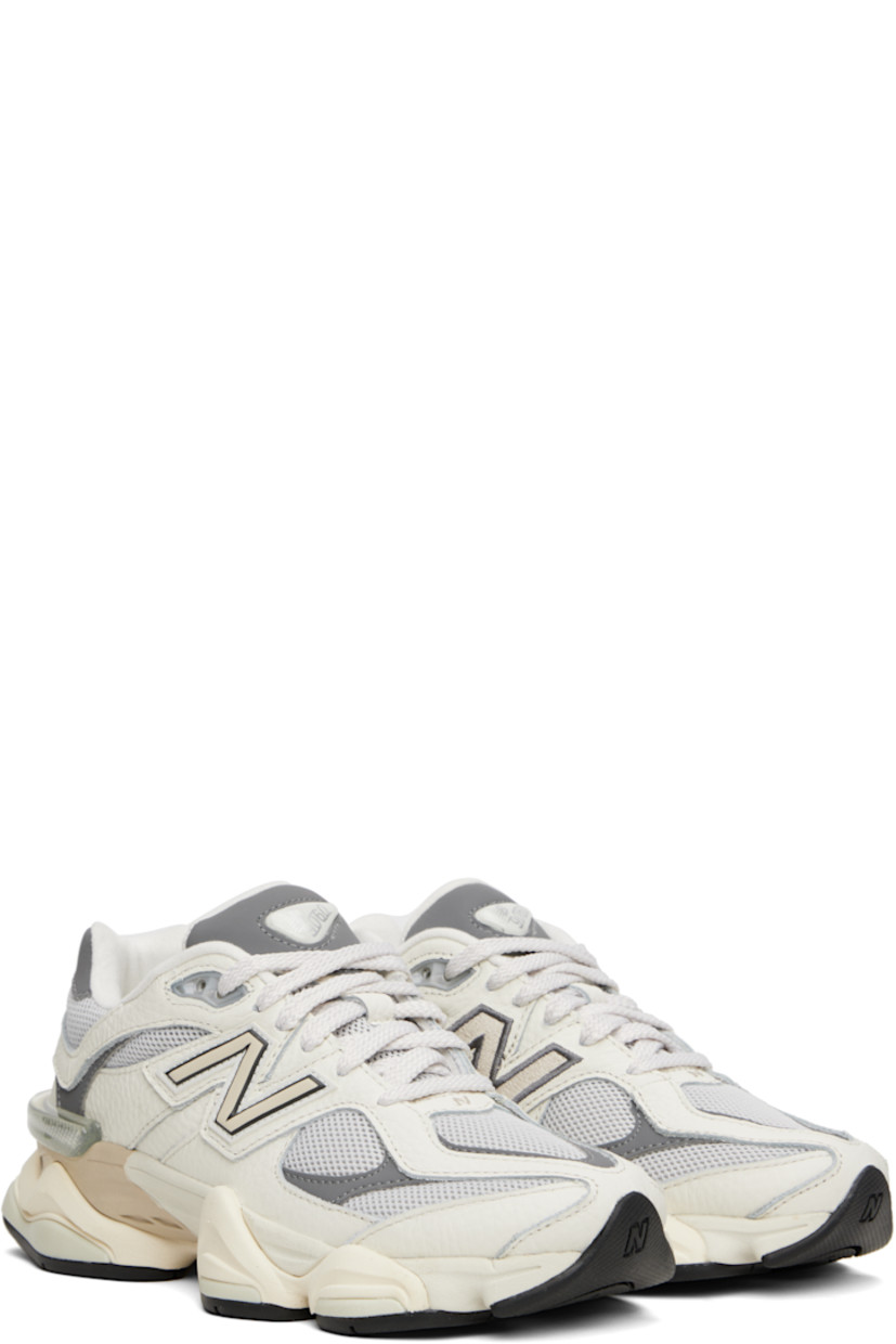 Low-top mesh and pigskin suede sneakers in white and gray.

· Logo embroidered at vamp and heel tab
· Lace-up closure
· Inset logo patch at padded tongue
· Padded collar
· Logo appliqué at sides
· Jersey lining
· CR stability unit at heel
· ABZORB SBS foam rubber midsole
· Treaded rubber sole

Supplier color: Sea salt/White/Grey