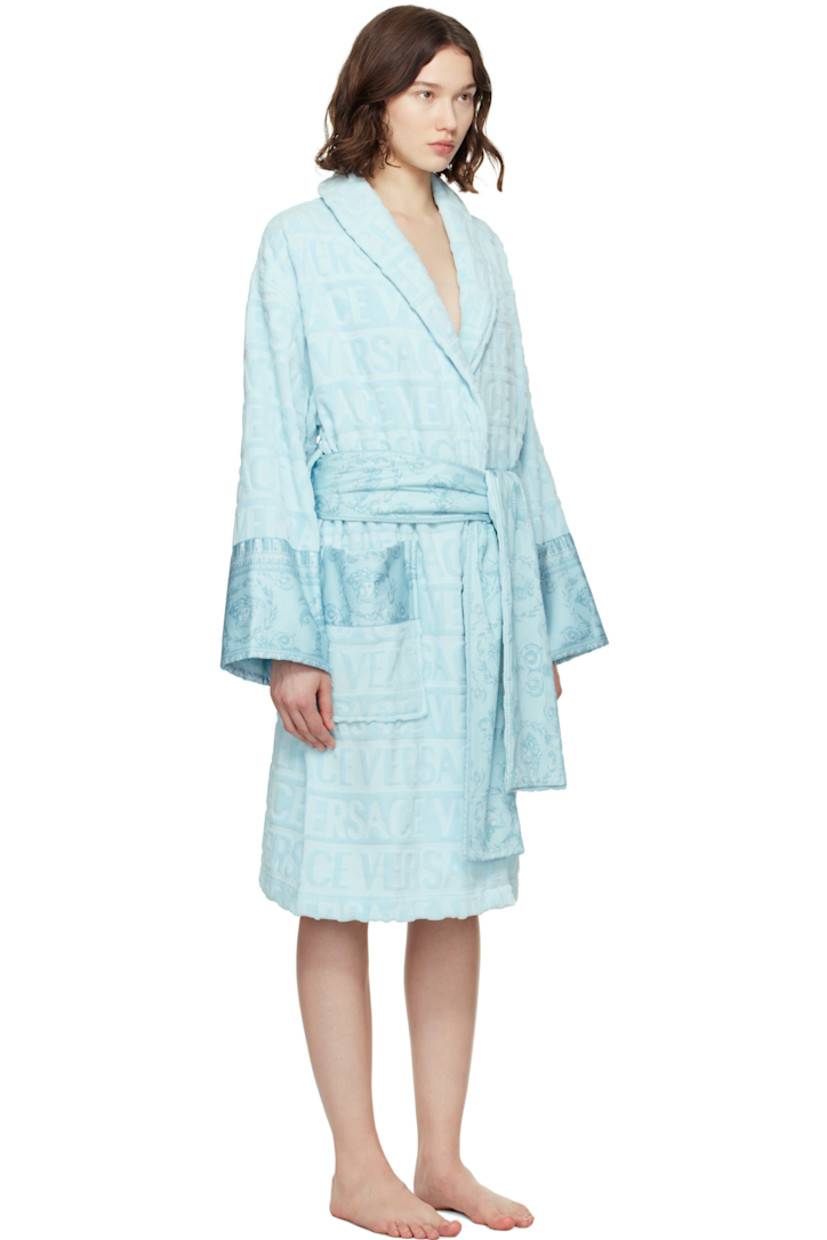 Cotton terrycloth bathrobe. Jacquard logo pattern and Barocco-patterned poplin trim throughout.

· Shawl collar
· Belt loops with detachable self-tie belt
· Patch pockets at waist

Supplier color: Pale blue