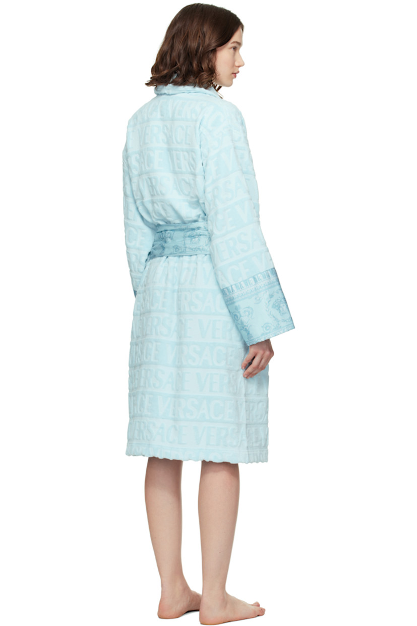 Cotton terrycloth bathrobe. Jacquard logo pattern and Barocco-patterned poplin trim throughout.

· Shawl collar
· Belt loops with detachable self-tie belt
· Patch pockets at waist

Supplier color: Pale blue