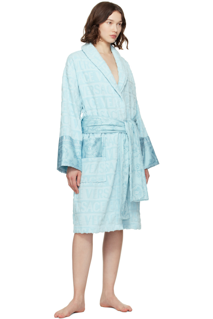 Cotton terrycloth bathrobe. Jacquard logo pattern and Barocco-patterned poplin trim throughout.

· Shawl collar
· Belt loops with detachable self-tie belt
· Patch pockets at waist

Supplier color: Pale blue