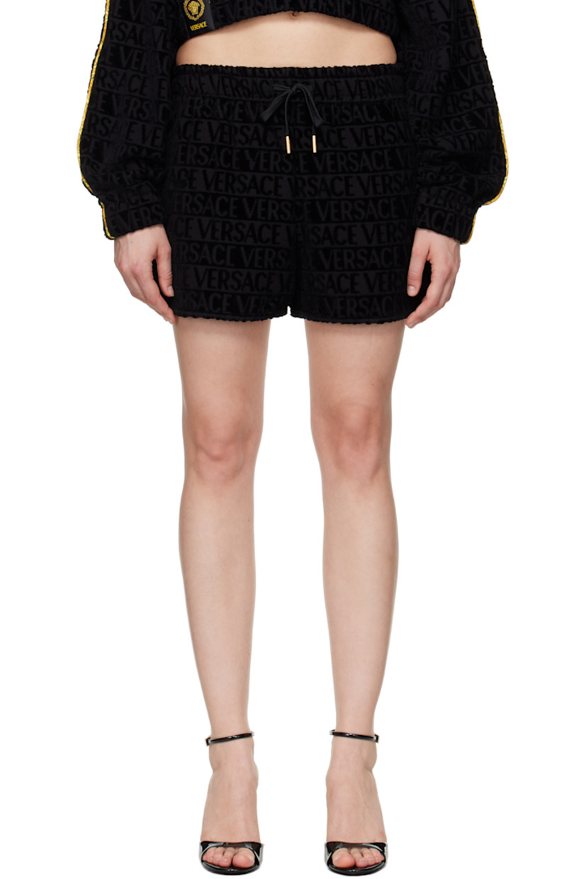 Cotton terrycloth shorts. Jacquard logo pattern throughout.

· Drawstring at elasticized waistband
· Two-pocket styling
· Barocco-patterned piping at outseams
· Vented outseams

Supplier color: Black/Print