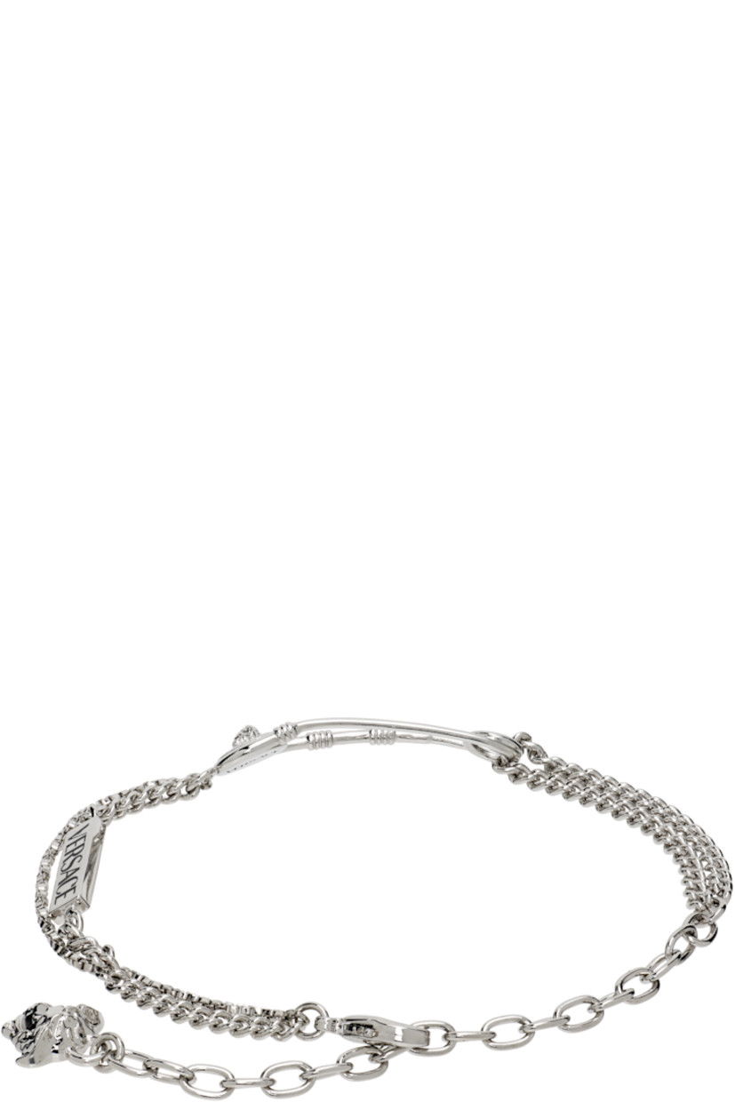 Tiered cable chain, curb chain, and box chain bracelet in silver tone.

· Logo plaque at length
· Medusa-engraved safety-pin hardware
· Logo charm at adjustable lobster-clasp fastening 
· L8.5"

Supplier color: Silver