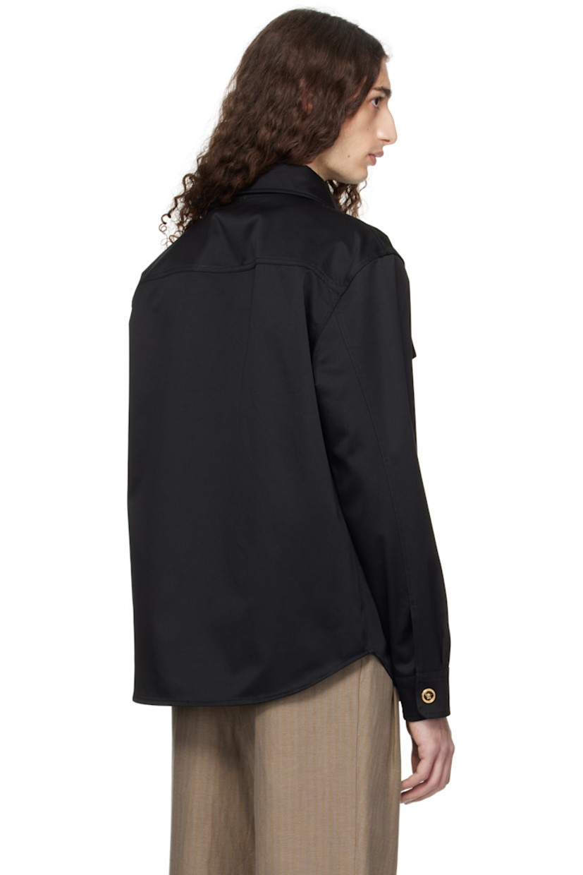 Cotton gabardine overshirt. 

· Spread collar
· Press-stud closure
· Flap pockets at chest
· Shirttail hem 
· Buttoned barrel cuffs
· Logo-engraved gold-tone hardware

Supplier color: Black