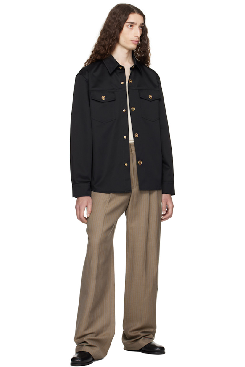 Cotton gabardine overshirt. 

· Spread collar
· Press-stud closure
· Flap pockets at chest
· Shirttail hem 
· Buttoned barrel cuffs
· Logo-engraved gold-tone hardware

Supplier color: Black