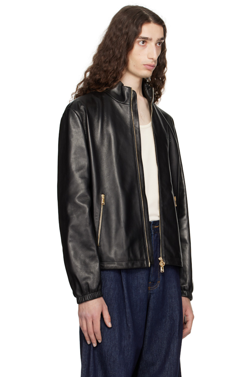 Grained lambskin jacket. 

· Stand collar
· Two-way zip closure
· Logo embossed at chest
· Zip pockets 
· Bungee-style drawstring at hem
· Elasticized cuffs
· Welt pocket at interior 
· Graphic-printed plain-woven lining 

Part of the La Vacanza collection.

Supplier color: Black