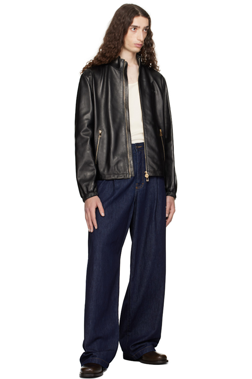 Grained lambskin jacket. 

· Stand collar
· Two-way zip closure
· Logo embossed at chest
· Zip pockets 
· Bungee-style drawstring at hem
· Elasticized cuffs
· Welt pocket at interior 
· Graphic-printed plain-woven lining 

Part of the La Vacanza collection.

Supplier color: Black