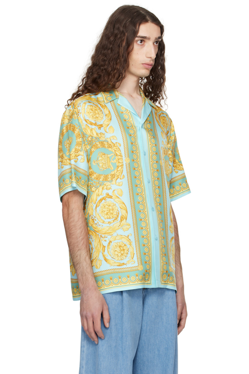 Silk twill shirt. Barocco pattern printed throughout.
 
· Open spread collar
· Button closure
· Vented side seams 

Part of the La Vacanza collection.

Supplier color: Green/Gold