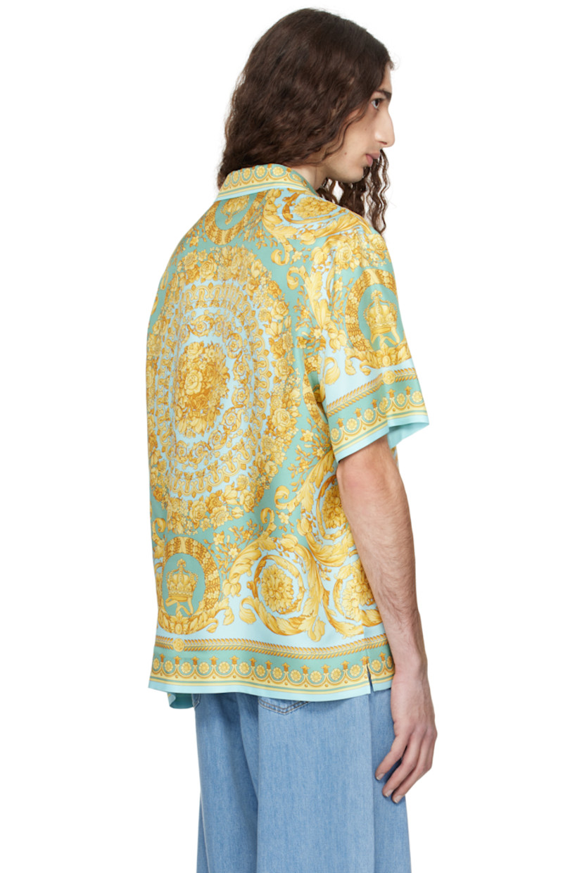 Silk twill shirt. Barocco pattern printed throughout.
 
· Open spread collar
· Button closure
· Vented side seams 

Part of the La Vacanza collection.

Supplier color: Green/Gold
