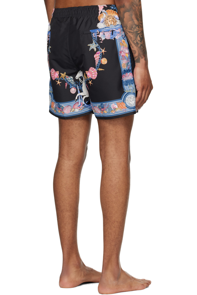 Taffeta swim shorts.

· Logo graphic pattern printed throughout
· Drawstring at elasticized waistband
· Three-pocket styling
· Mock fly
· Mesh brief-style lining
· Logo-engraved gold-tone hardware

Part of the La Vacanza collection.

Supplier color: Print