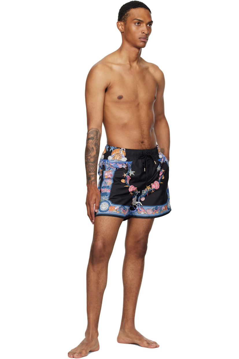 Taffeta swim shorts.

· Logo graphic pattern printed throughout
· Drawstring at elasticized waistband
· Three-pocket styling
· Mock fly
· Mesh brief-style lining
· Logo-engraved gold-tone hardware

Part of the La Vacanza collection.

Supplier color: Print