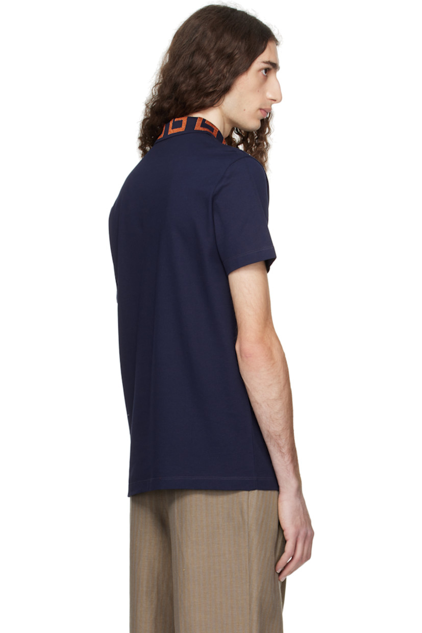 Cotton piqué polo.

· Rib-knit spread collar
· Glittered jacquard Greek key pattern at collar 
· Three-button placket 
· Medusa embroidered at chest 

Part of the La Vacanza collection.

Supplier color: Navy