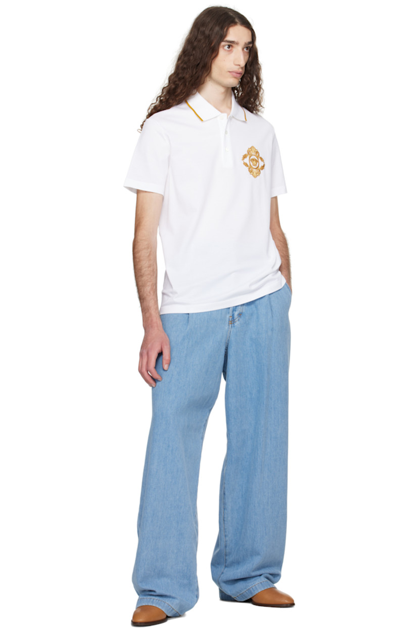 Cotton piqué polo. 

· Striped rib-knit spread collar
· Three-button placket 
· Embroidered logo graphic at chest

Supplier color: White