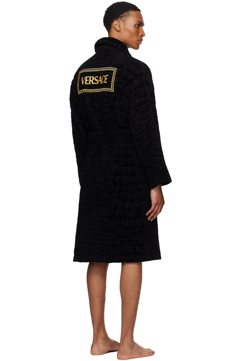 Cotton terrycloth bathrobe. Jacquard graphic pattern throughout.

· Shawl collar
· Medusa hardware at chest
· Patch pockets
· Belt loops and detachable self-tie belt
· Logo embroidered at back

Supplier color: Black